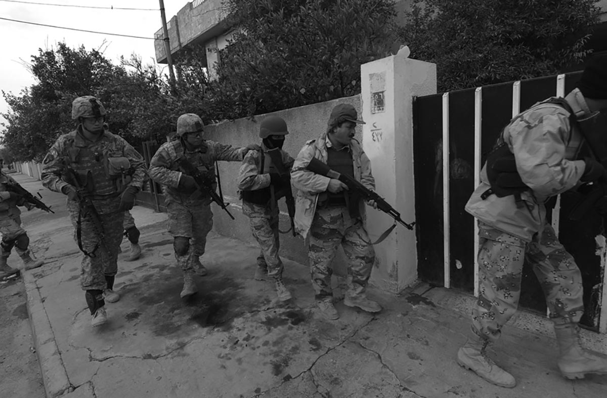 Security is paramount: Infantrymen from the 172d Stryker Brigade Combat Team patrolling the streets of Mosul, January 2006.